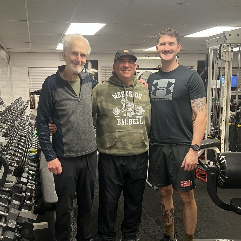 Clients of different generations with their coach at Icon Performance
