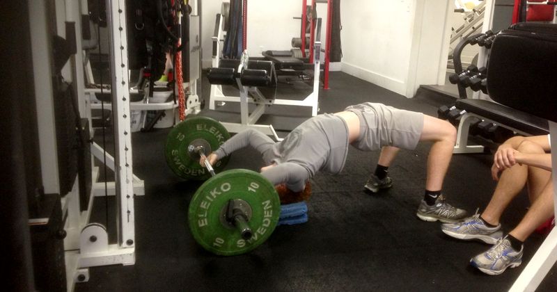 Athlete performing a barbell hip thrust